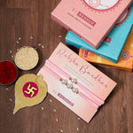 El Regalo 2PCs Pearls Rakhi Combo Set for Bhaiya-Bhabhi/Bhai- Bhatija/Bhatiji- Rakhi Gift Combo with 2 Pearls Rakhi, Roli-Chawal Shagun Pack, Message Card in Gift Box (Pink)