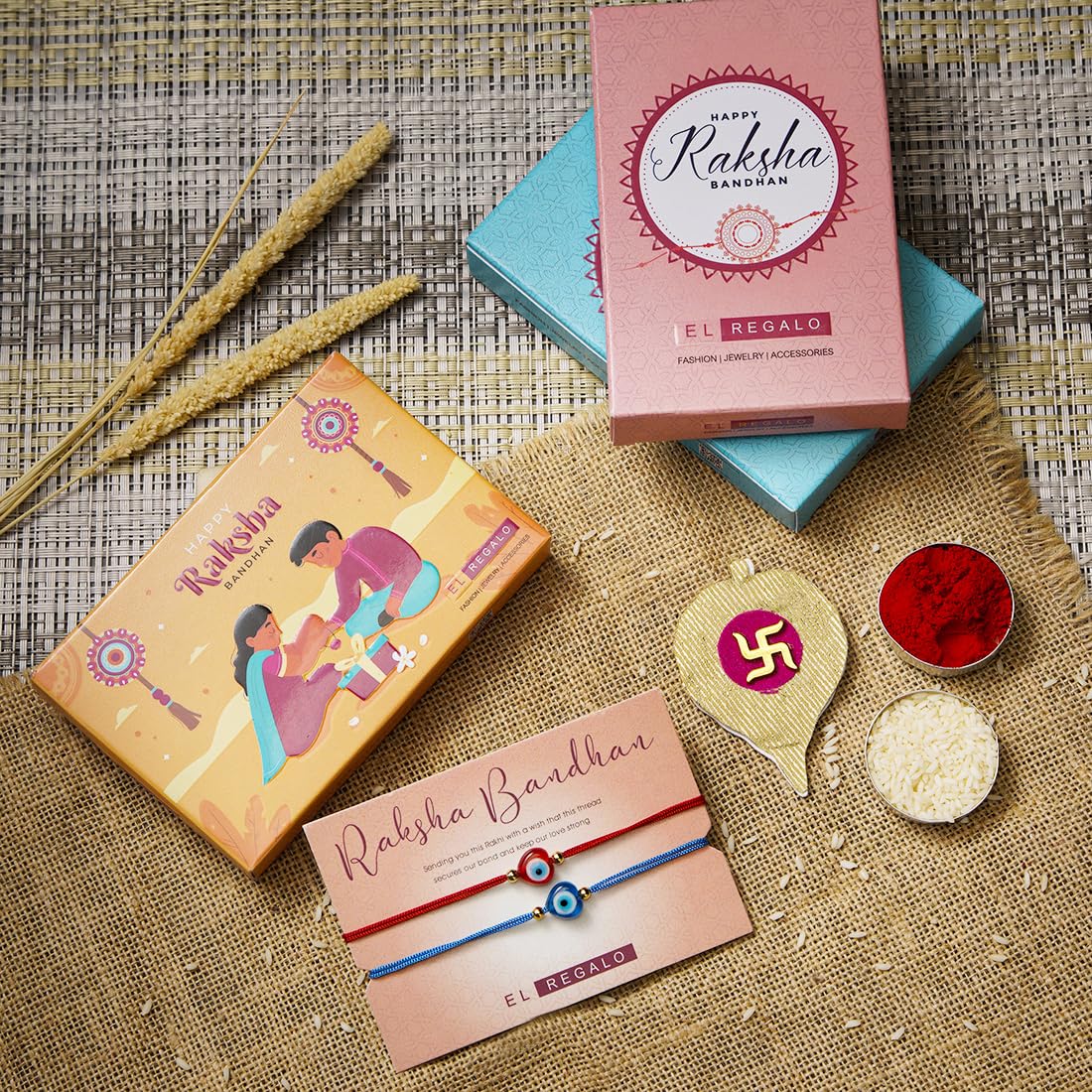 El Regalo 2PCs Evil Eye Rakhi Combo Set for Bhai-Bhabhi or Bhai-Bhatija/Bhatiji- 2 Evil Eye Rakhis with Roli Chanwal, Rakhi Card in Rakhi Gift Box (Option-5)