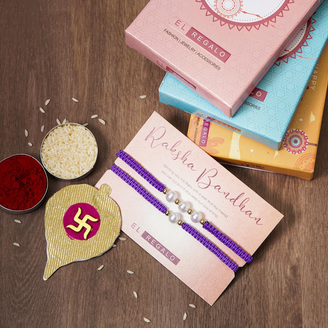 El Regalo 2PCs Pearls Rakhi Combo Set for Bhaiya-Bhabhi/Bhai- Bhatija/Bhatiji- Rakhi Gift Combo with 2 Pearls Rakhi, Roli-Chawal Shagun Pack, Message Card in Gift Box (Purple)