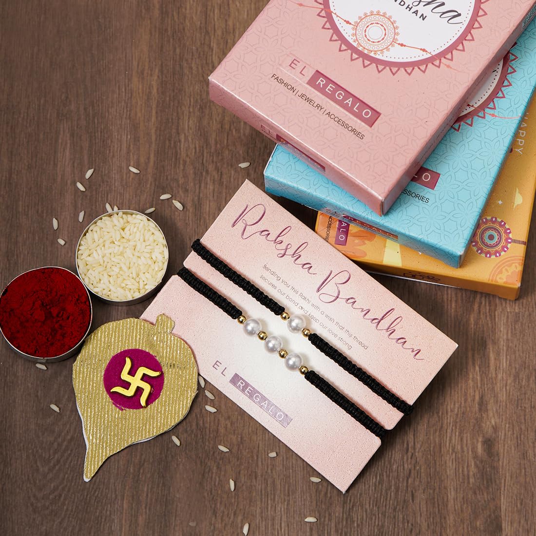 El Regalo 2PCs Pearls Rakhi Combo Set for Bhaiya-Bhabhi/Bhai- Bhatija/Bhatiji- Rakhi Gift Combo with 2 Pearls Rakhi, Roli-Chawal Shagun Pack, Message Card in Gift Box (Light Blue)