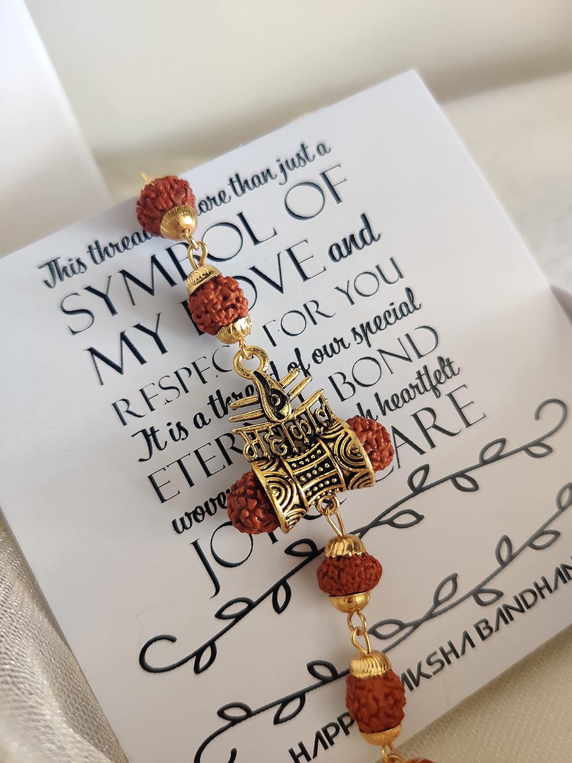 El Regalo OM Rudraksha Mahakal Metallic Golden Brass Bracelet Rakhi for Brother Rudraksha Rakhi with shagun, Rakhi Message Card in Rakhi Gift Box Rakhi for Bhai