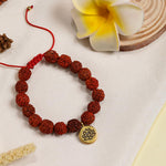 El Regalo Unisex 1 PC Natural Rudraksha Beads Adjustable Bracelet: Handmade Lord Shiva Rudraksha Beads Bracelet with Spritual OM/Aum, Budhdha, Lotus Charms (Golden Lotus Rudraksha Bracelet)