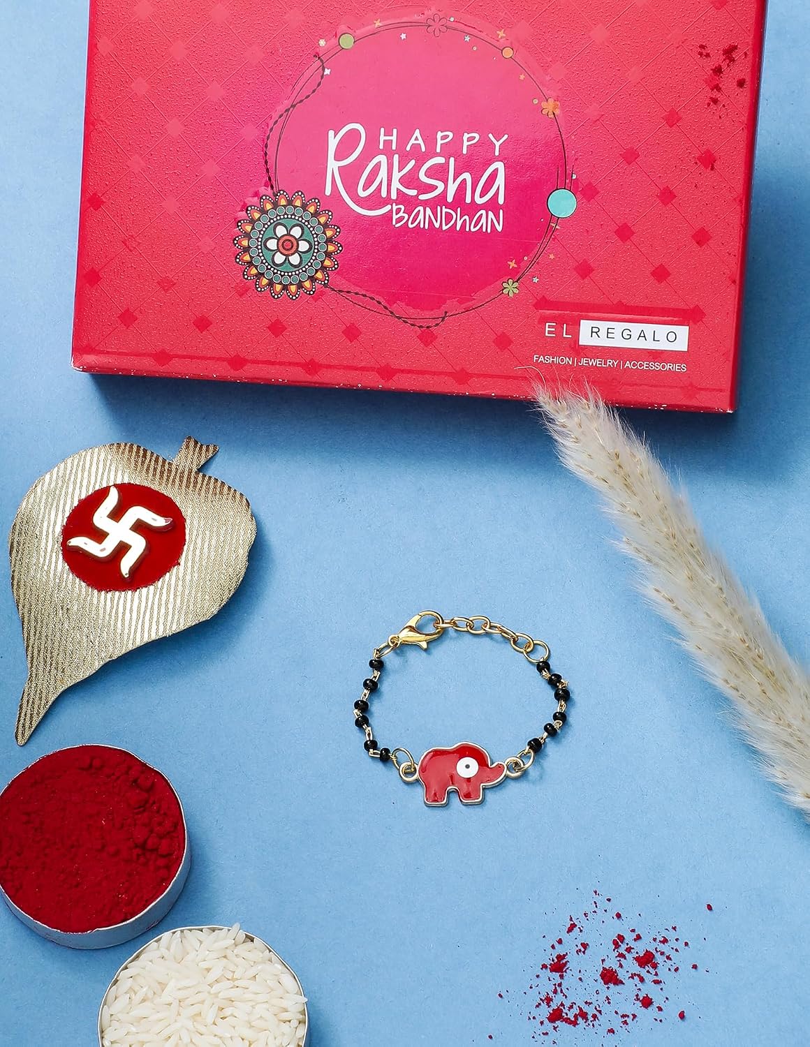 El Regalo Cute Evil Eye Nazaria Bracelet Rakhi for Babies/Kids with Roli Chawal, Rakhi Message card in Rakhi Gift Box- Baby Nazaria Rakhi (Red Elephant Nazaria Rakhi)
