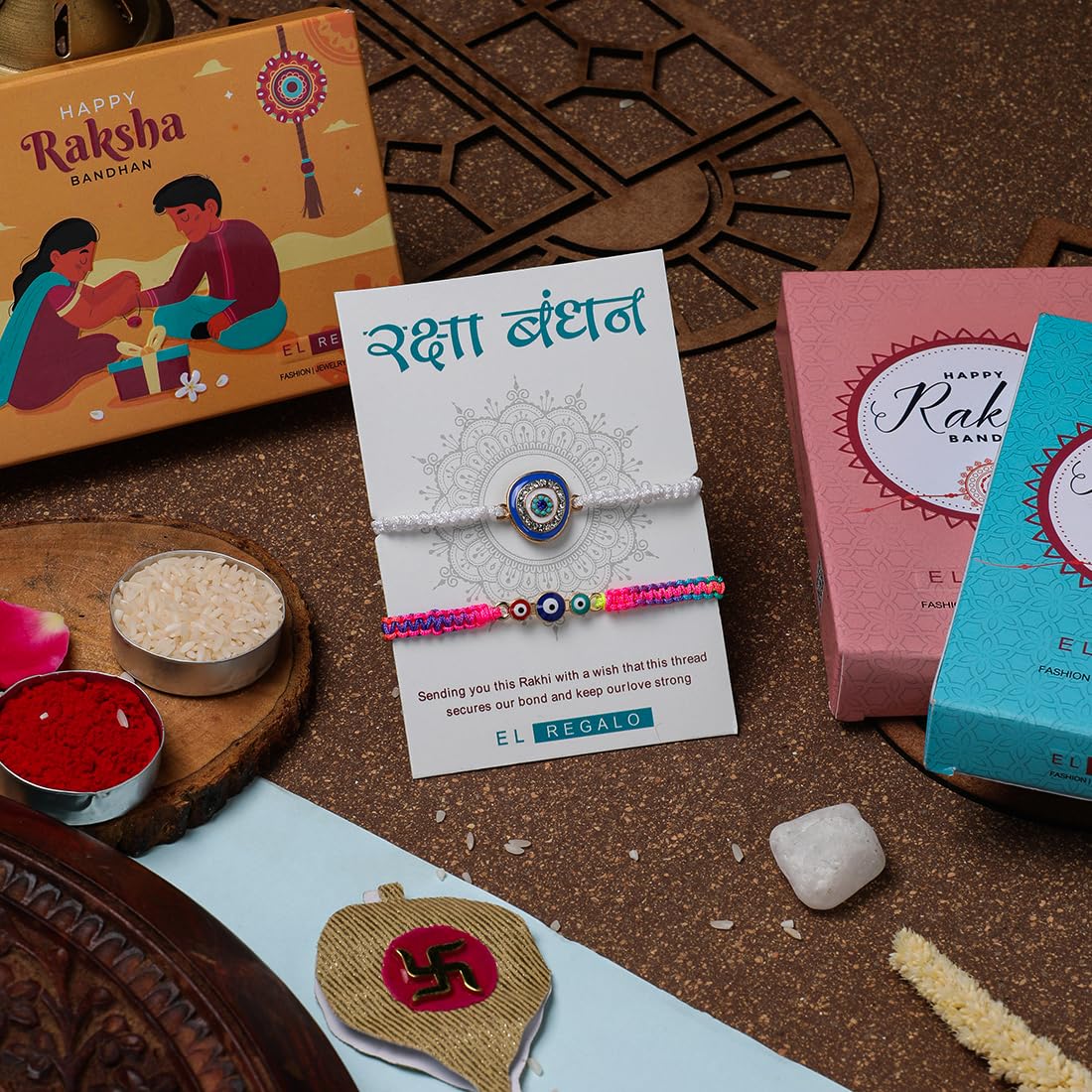 El Regalo 2 PCs Evil Eye Hamsa Hand Couple Rakhi Set for Bhaiya & Bhabhi- Bhaiya Bhabhi Rakhi Combo with Roli Chawal, Rakhi Message Card in Rakhi Gift Box (Option-1)