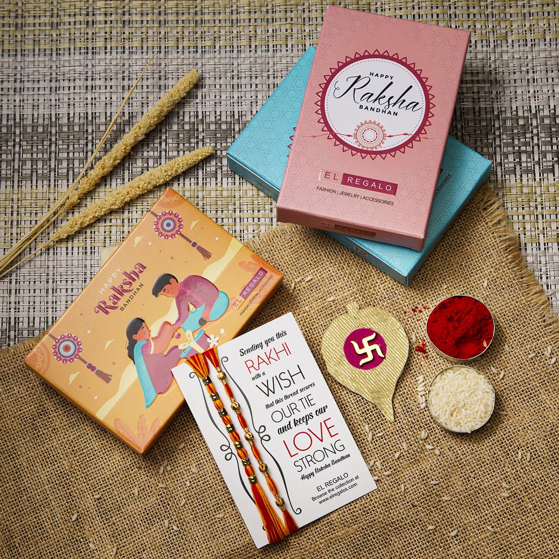 El Regalo 2PCs Red & Yellow Moli Thread Rakhi Combo Set for Brother- Auspicious OM, Ganesha, Satiya, Lion etc. Mauli Rakhi with Roli Chawal Shagun, Message Card in Rakhi Gift Box (Option-5)