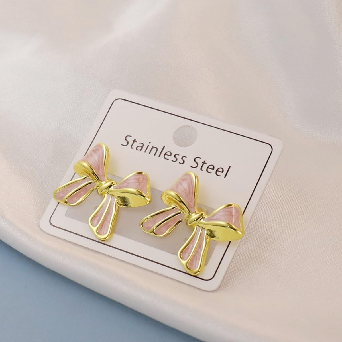 El Regalo 1Pair Stainless Steel Anti-Tarnish Pink Enamel Earrings for Girls & Women | Trendy & Cute Leaf, Bow, Ribbon, Strawberry & Butterfly Stud Earrings (Ribbon Bow Stud)