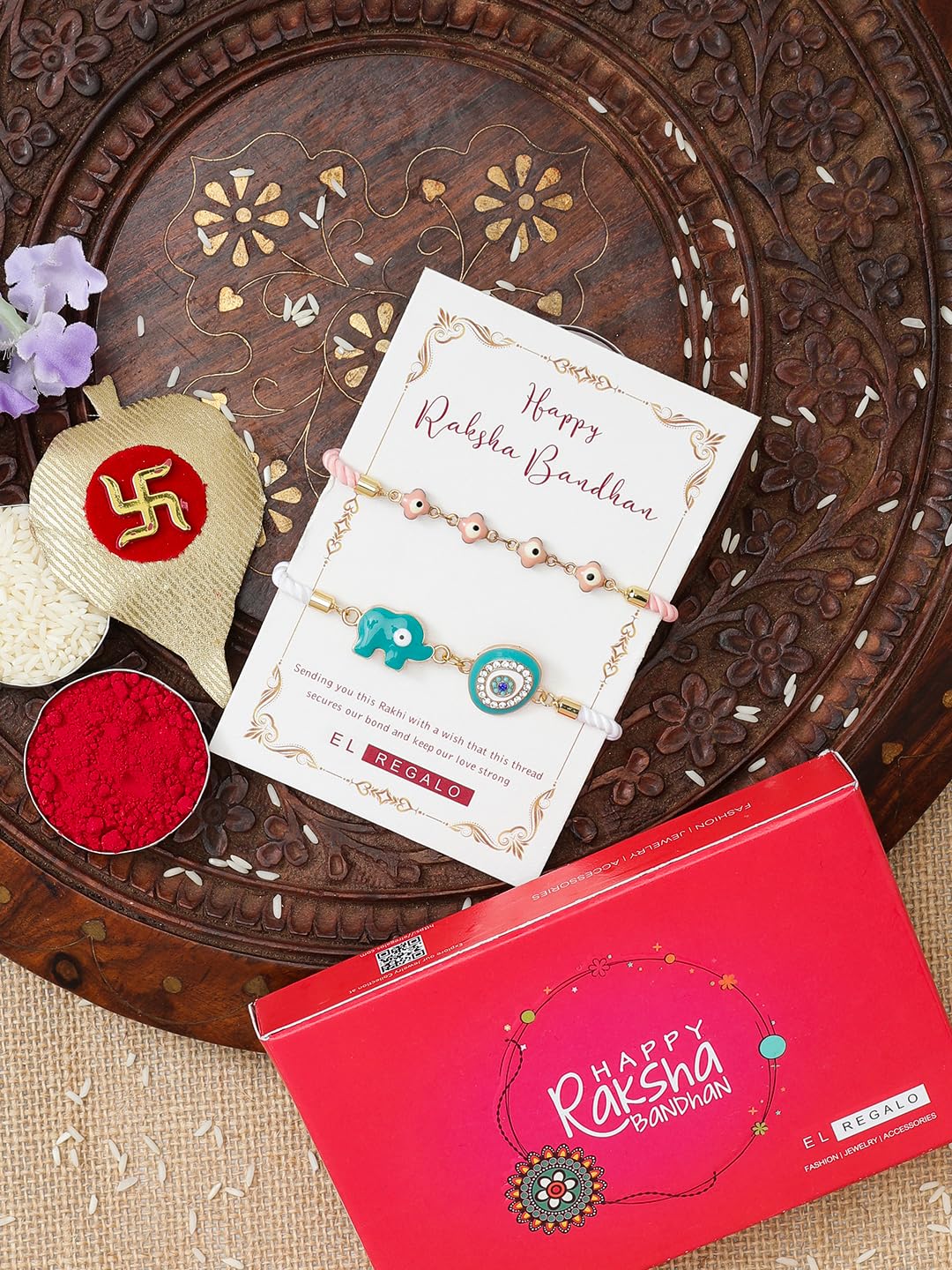 El Regalo Designer Rakhi Set for Bhaiya & Bhabhi - 2PCs CZ Evil Eye Hamsa Hand Bracelet Rakhi Combo with Roli Chawal & Rakhi Message Card in Gift Box (Elephant Evil Eye Combo)
