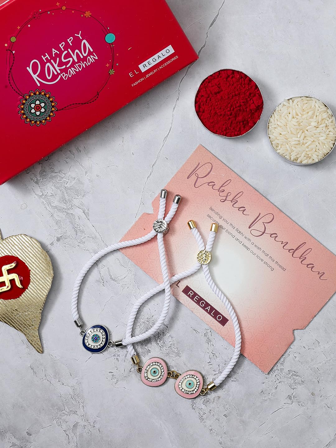 El Regalo 2PCs Designer Evil Eye CZ Rakhi Combo Set for Brothers/Bhaiya-Bhabhi/Brother-Nephew with Roli Chawal, Rakhi Message Card in Rakhi Gift Box (Blue & Pink)