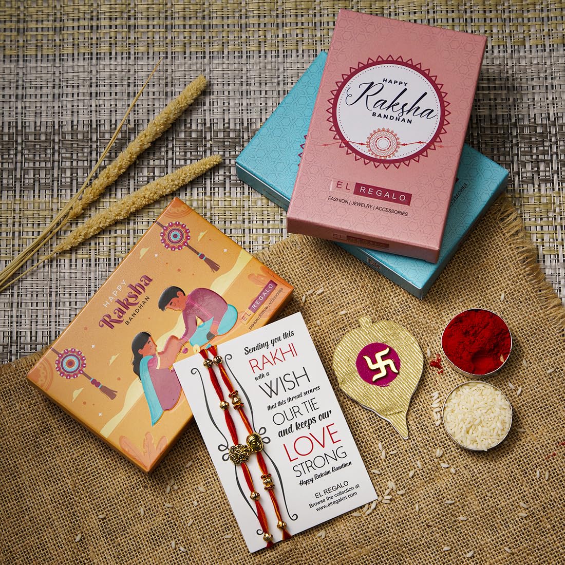 El Regalo 2PCs Red & Yellow Moli Thread Rakhi Combo Set for Brother- Auspicious OM, Ganesha, Satiya, Lion etc. Mauli Rakhi with Roli Chawal Shagun, Message Card in Rakhi Gift Box (Option-3)
