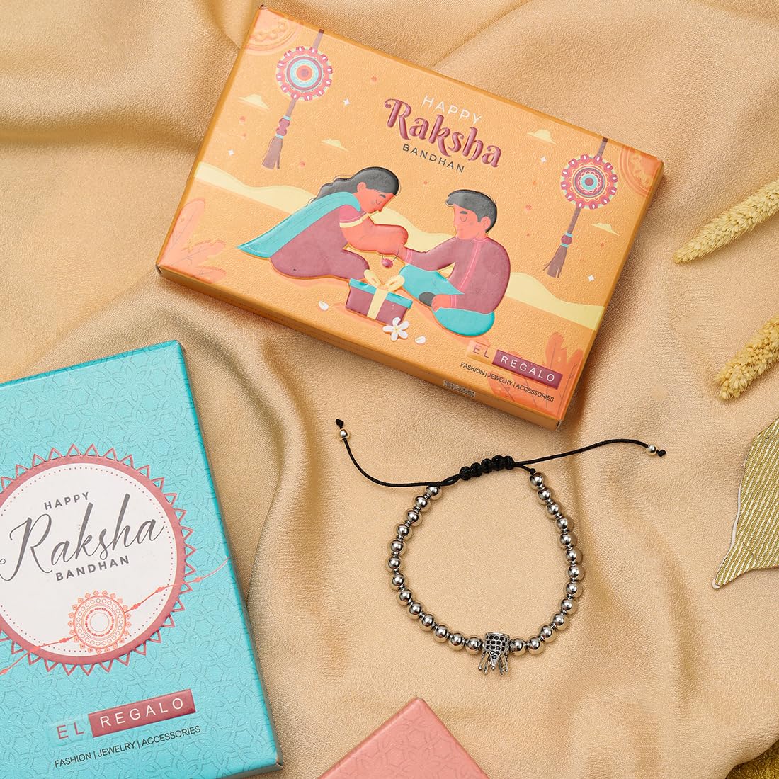 El Regalo 1 PC Designer CZ Crown Bracelet Rakhi for Brother/Bhai- Fancy Sparkly Crown Rakhi with Roli-Chawal Shagun, Rakhi Message Card in Rakhi Gift Box