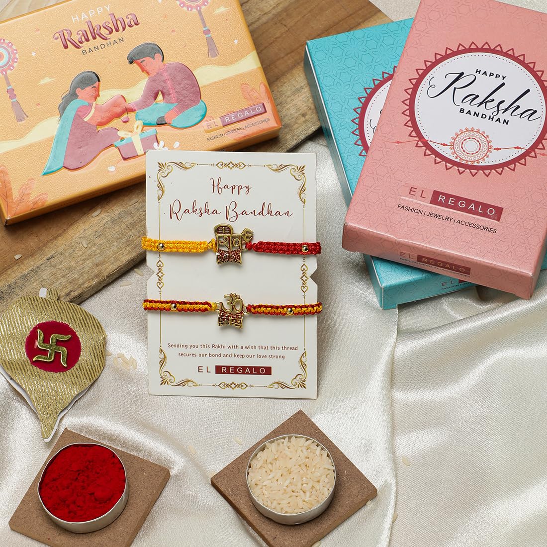 El Regalo 2PCs Red & Yellow Thread Bracelet Rakhi Combo Set for Brother- Auspicious OM, Ganesha, Shree, Trident, Damroo Mauli Rakhi with Roli Chawal Shagun, Message Card in Rakhi Gift Box (Option-2)