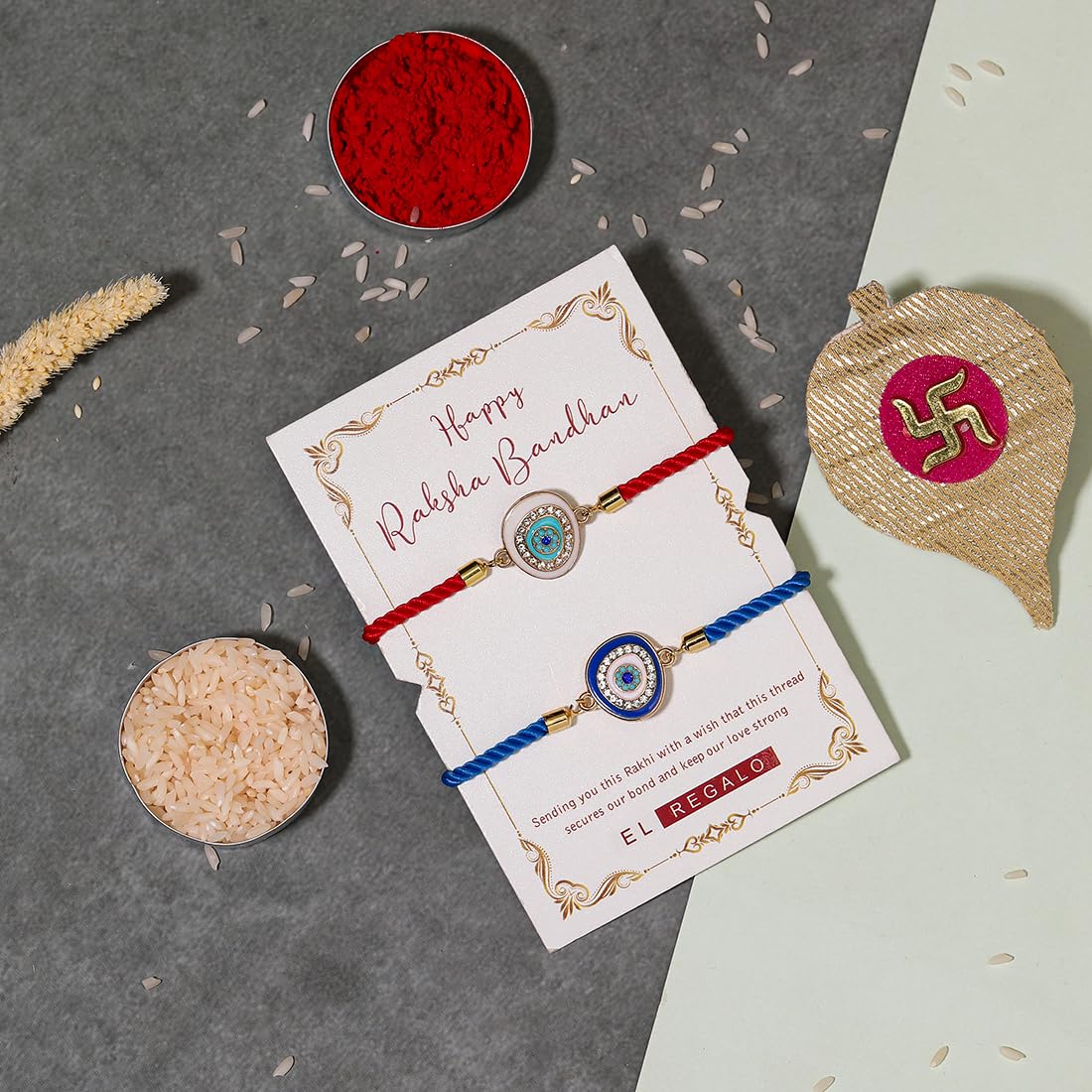 El Regalo 2PCs Designer Evil Eye CZ Rakhi Combo Set for Brothers/Bhaiya-Bhabhi/Brother-Nephew with Roli Chawal, Rakhi Message Card in Rakhi Gift Box