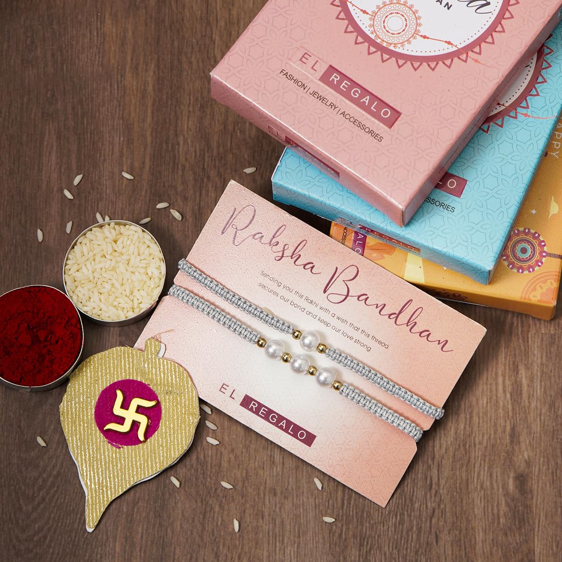 El Regalo 2PCs Pearls Rakhi Combo Set for Bhaiya-Bhabhi/Bhai- Bhatija/Bhatiji- Rakhi Gift Combo with 2 Pearls Rakhi, Roli-Chawal Shagun Pack, Message Card in Gift Box (Grey)