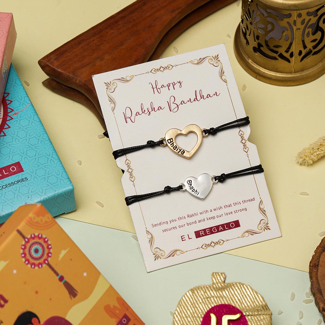 El Regalo 2PC Minimalist Matchin Hearts Bhaiya Bhabhi Rakhi Set- Bhaiya & Bhabhi Engraved Heart Rakhis with Roli-Chawal Shagun Pack, Rakhi Message Card in Rakhi Gift Box for Brother & Sister-in-law