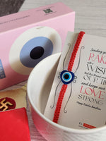 El Regalo 1 Evil Eye Rakhi with and Raksha Bandhan Card - Lucky Evil Eye Protection Rakhi to Avoid Negative Energies for Brother/Sister-in-Law/Niece or Nephew (Heart Evil Eye)