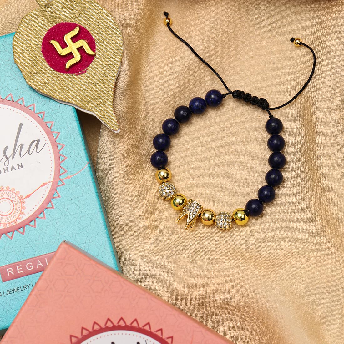 El Regalo 1 PC Natural Stones AD King Crown Rakhi for Brother/Bhai- Designer Handcrafted Natural Stones Rakhi with Roli-Chawal Shagun, Rakhi Message Card in Rakhi Gift Box (Blue & Golden)
