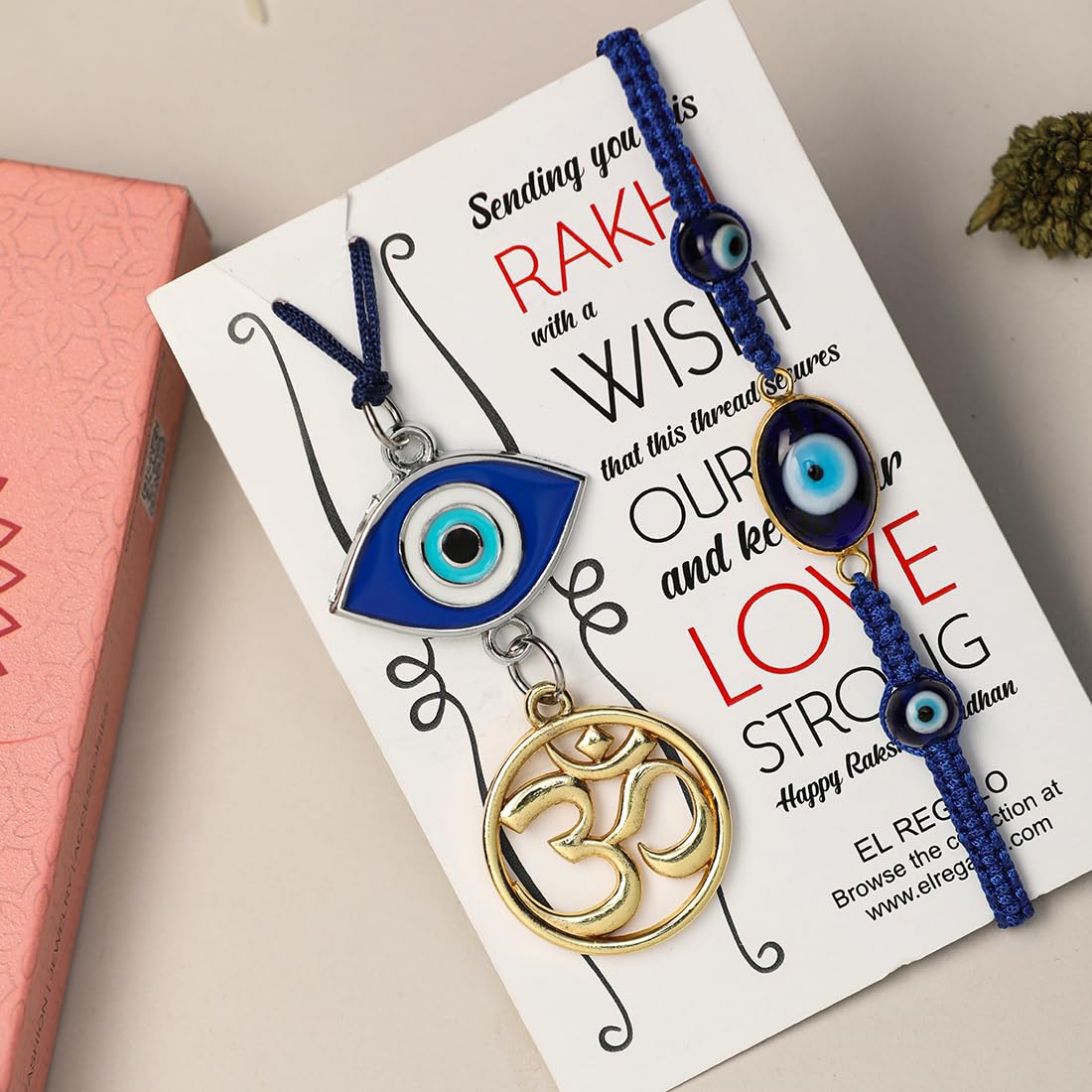 El Regalo 2 PCs OM Evil Eye Couple Rakhi Set for Bhaiya and Bhabhi- Bhaiya Bhabhi Luma Rakhi Set- Brother/Bhabhi Rakhi Combo