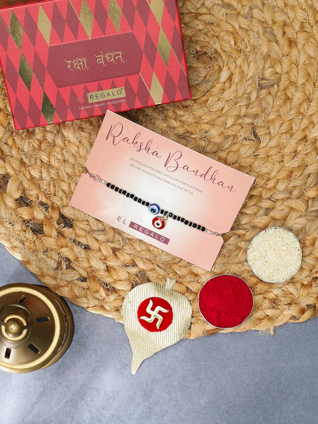 El Regalo Cute & Fancy Baby Evil Eye Nazaria Bracelet Rakhi with Roli Chawal, Rakhi Message Card in Rakhi Gift Box - Kids Evil Eye Adjustable Chain Rakhi (Red Evil Eye Nazaria Rakhi)