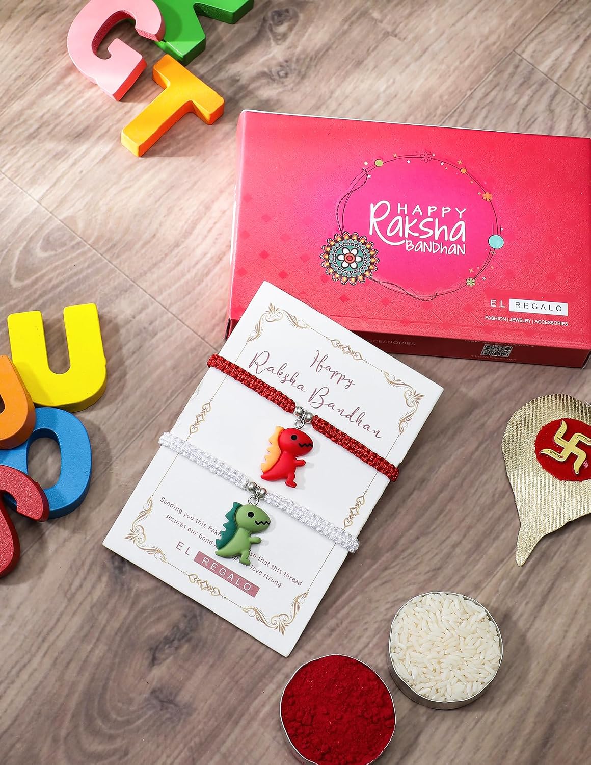 El Regalo 2PCs Cute Kids Dinosaur Bracelets Rakhi Combo for Brother with Roli Chawal, Rakhi Message Card in Rakhi Gift Box (Orange, Green)