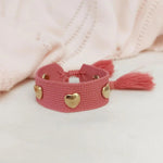 El Regalo Bohemian Style Heart Charm Rivet Tassel Unisex Bracelet | Handcrafted Woven Rope Bracelet with Golden Heart Charms and Adjustable Knot Closure (Berry Pink)