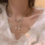 El Regalo Stainless Steel Bow Tie Pearl Necklace- Anti Tarnish, Waterproof, Minimalist, Statement Bow Choker Ribbon Necklace for Girls & Women (Bow Tie Pearl Tassel)