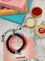 El Regalo 2 PCs Magnetic Heart Natural Beads Couple Rakhi Set for Bhaiya & Bhabhi- 2 Natural Beads Rakhis with Roli Chawal Shagun, Rakhi Message Card in Rakhi Gift Pack (Pink & Black Stones)