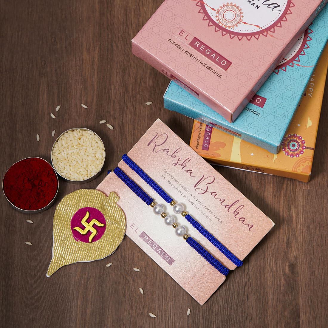 El Regalo 2PCs Pearls Rakhi Combo Set for Bhaiya-Bhabhi/Bhai- Bhatija/Bhatiji- Rakhi Gift Combo with 2 Pearls Rakhi, Roli-Chawal Shagun Pack, Message Card in Gift Box (Blue)