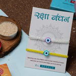 El Regalo 2PCs Rakhi Combo Set for Bhai-Bhabhi or Bhai-Bhatija/Bhatiji- 2 Evil Eye Rakhis Set with Roli Chanwal, Rakhi Card in Rakhi Gift Box (Option-2)