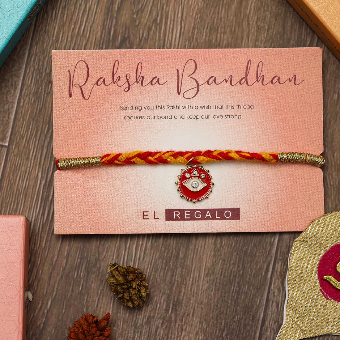 El Regalo 1 PC Moli Rakhi for Bhaiya - Rakshabandhan Moli Charms Rakhi with Message Card & Roli Chawal Shagun in Rakhi Box (Red Evil Eye Moli Rakhi)