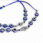 El Regalo 2PCs Evil Eye Rakhi Combo Set for Bhai-Bhabhi or Bhai-Bhatija/Bhatiji- 2 Evil Eye Rakhis with Roli Chanwal, Rakhi Card in Rakhi Gift Box (Option-6)