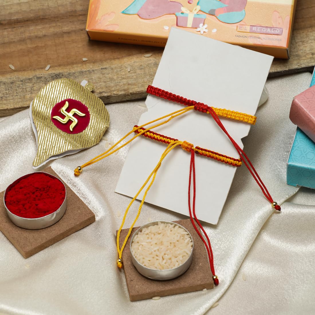 El Regalo 1PC Auspicious Thread Rakhi Brother- Red & Yellow Thread OM, Ganesha, Shree, Trident, Damroo Mauli Rakhi with Roli Chawal Shagun, Message Card in Rakhi Gift Box (Shiv Rakhi)