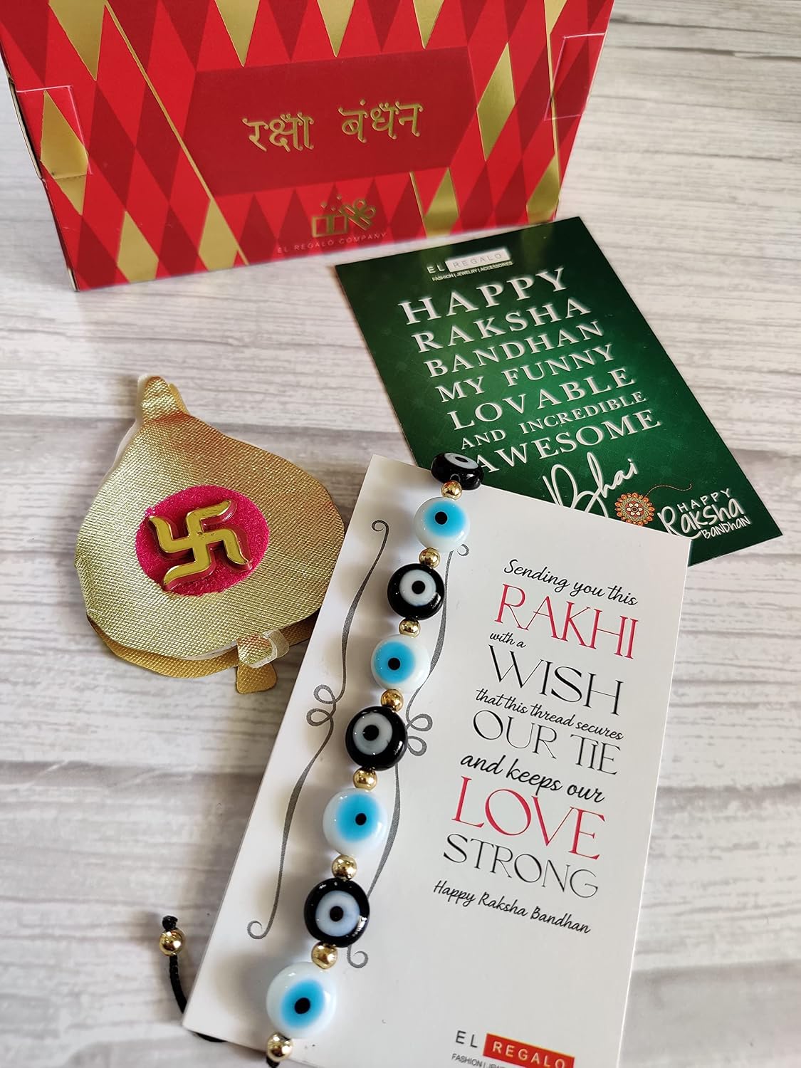 El Regalo Rakhi for Brother - Evil Eye Rakhi for Bhai/Bhabhi with, shagun & Message Card in Rakhi Gift Box (Black White Mix Evil Eye Rakhi)