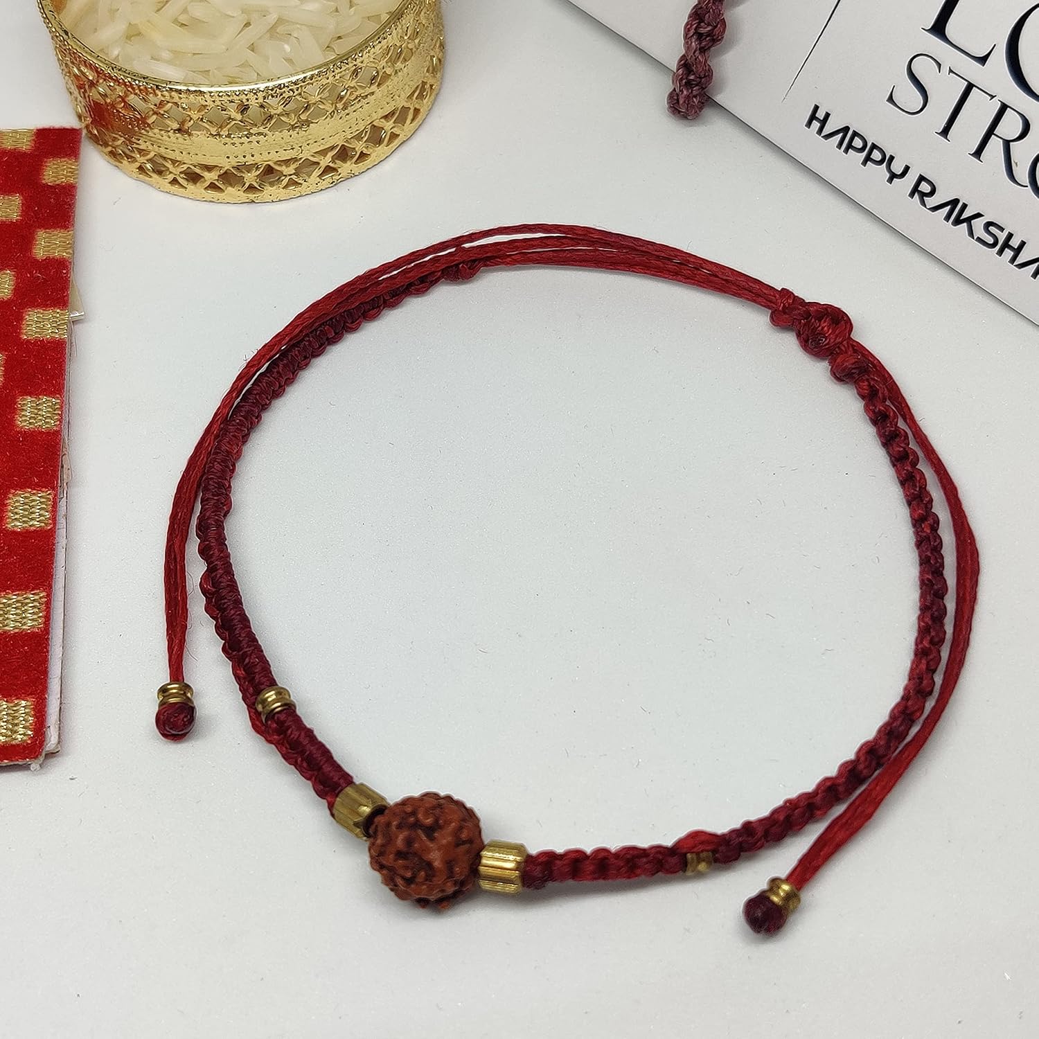 El Regalo Elegant Rudraksha Rakhi for Bhaiya/Bhabhi/Niece/Nephew Lord Shiva Mediation Rudraksha Bracelets Rakhi with shagun, Rakhi Card in Gift Box