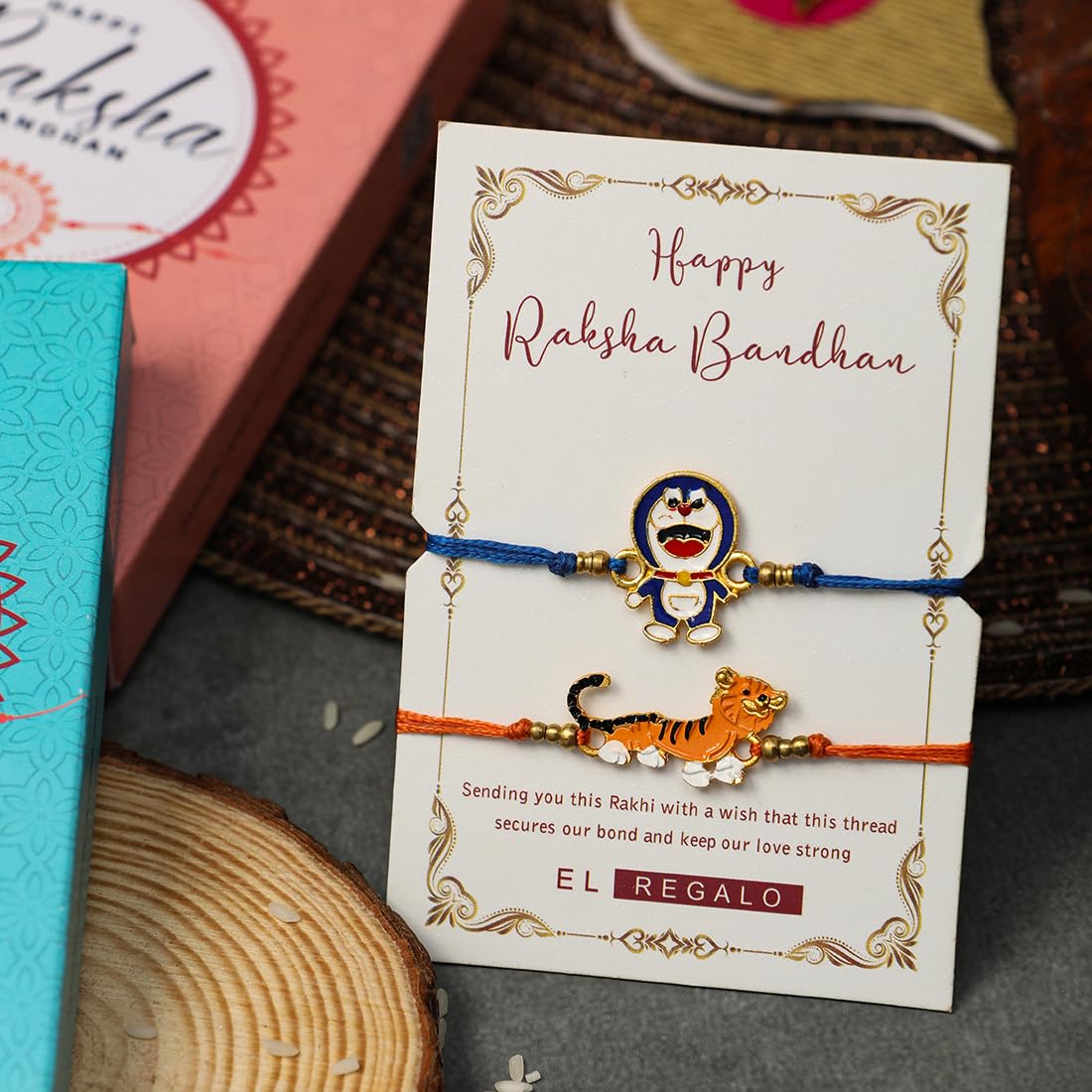 El Regalo 2 PCs Kids Rakhis Combo Set - Cute 2 Kids Rakhis Set with Roli- Chanwal, Rakhi Message Card in Rakhi Gift Box for Little Brother/Niece/Nephew (Tiger & Doremon Rakhi)