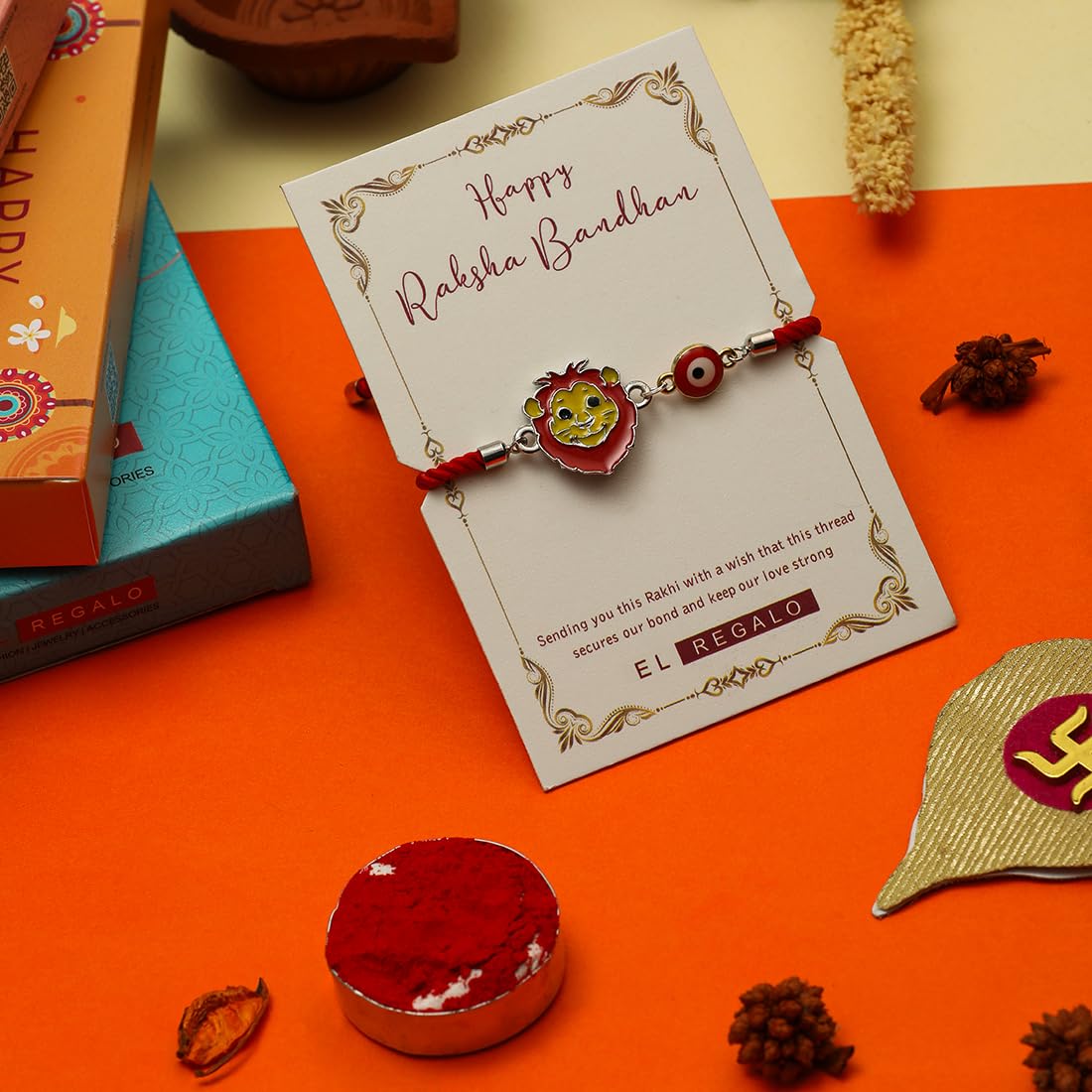 El Regalo Designer Evil Eye Lion Kids Rakhi for Brother- Cute Evil Eye Lion Rakhi with Roli Chawal Shagun, Rakhi Message Card in Rakhi Gift Box for Little Brother (Red)