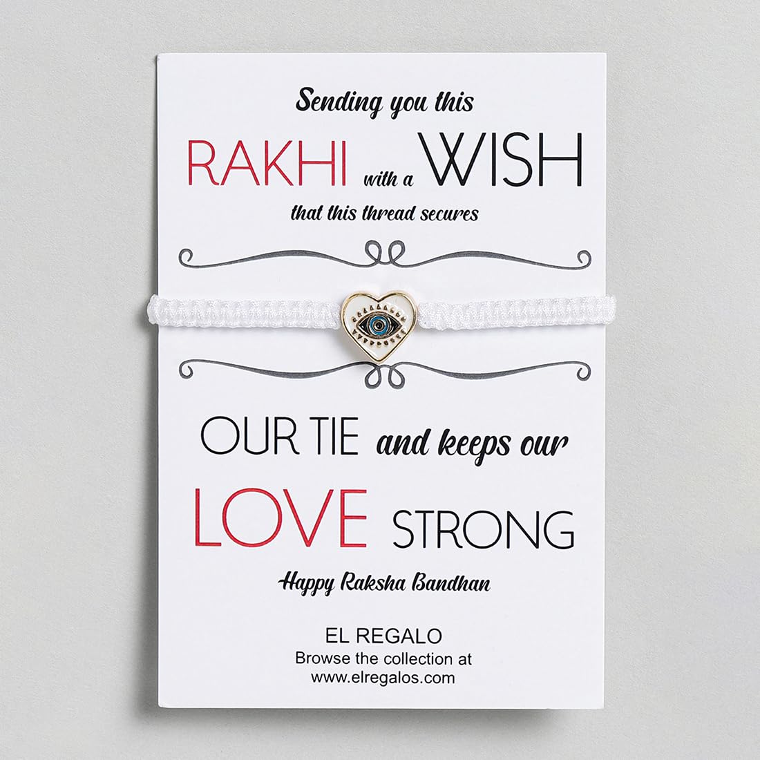 El Regalo 1 PC Heart Evil Eye Nazaria Rakhi for Brother- 1 PC Rakhi, Shagun Pack & Rakhi Message Card in Gift Box - Rakhi for Bhai/Bhabhi/Bhatija/Bhatiji (White Heart Evil Eye)