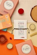 El Regalo Elegant Evil Eye/Hamsa Hand Rakhi for Brother- Beautiful Bracelet Rakhi for Bhai with Roli Chanwal, Message Card in Rakshabandhan Box (Evil Eye)
