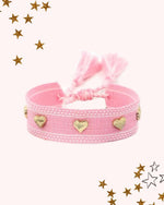 El Regalo Bohemian Style Heart Charm Rivet Tassel Unisex Bracelet | Handcrafted Woven Rope Bracelet with Golden Heart Charms and Adjustable Knot Closure (Pink)