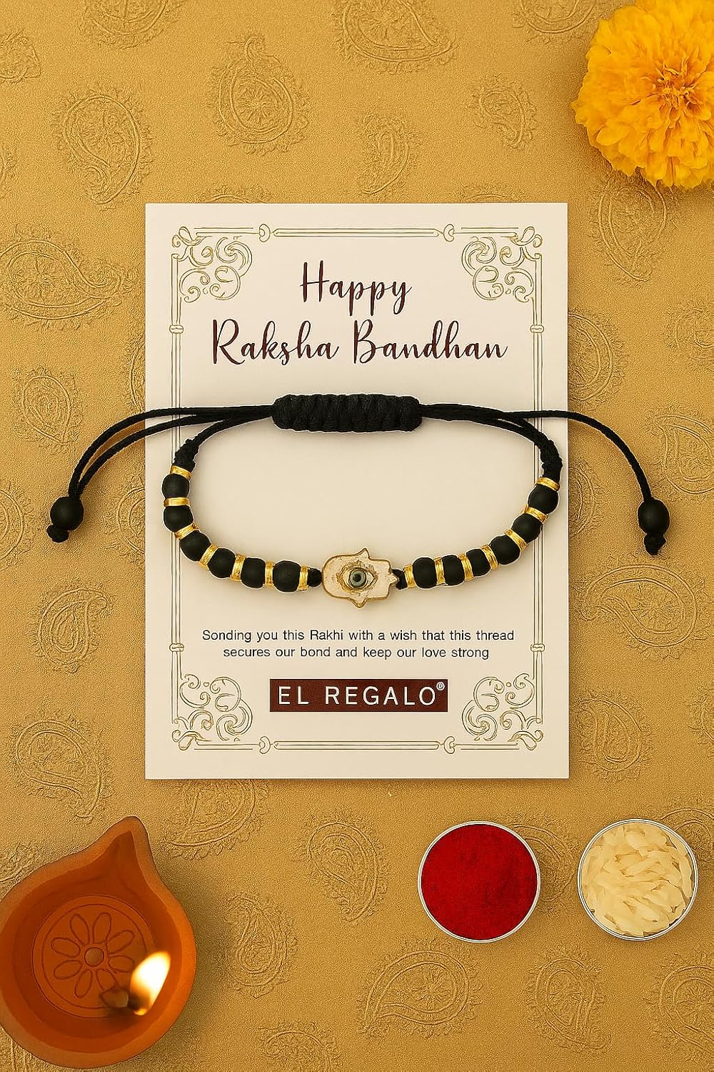 El Regalo Elegant Evil Eye/Hamsa Hand Rakhi for Brother- Beautiful Bracelet Rakhi for Bhai with Roli Chanwal, Message Card in Rakshabandhan Box (Hamsa Hand)