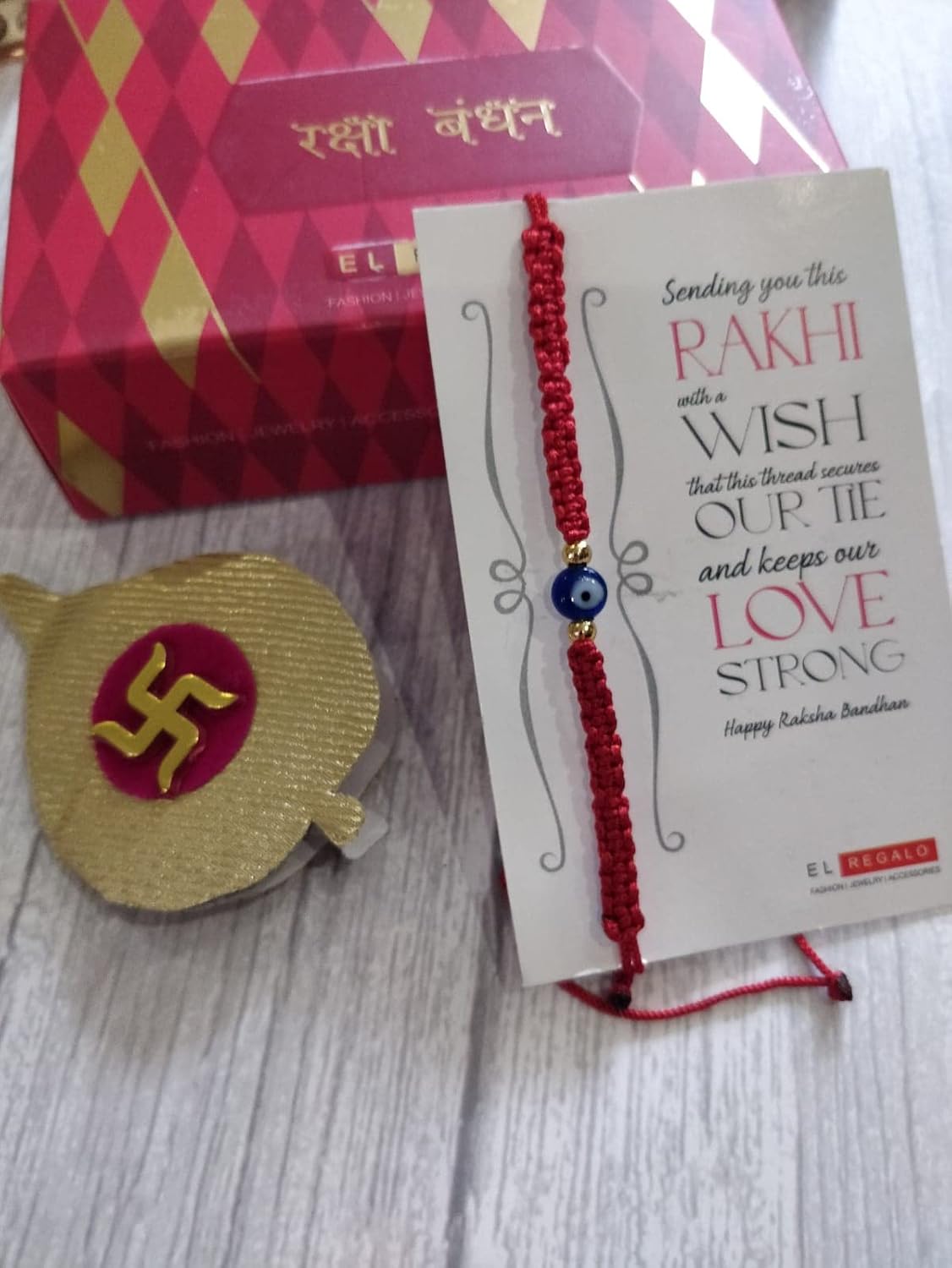 El Regalo Rakhi for Babies - beautiful Evil Eye Nazaria Rakhis for Little Brother/Niece/Nephew Rakhis for Kids/Babies/Toddlers (Red Evil Round)