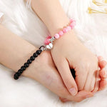 El Regalo 2 PCs Magnetic Heart Natural Beads Couple Rakhi Set for Bhaiya & Bhabhi- 2 Natural Beads Rakhis with Roli Chawal Shagun, Rakhi Message Card in Rakhi Gift Pack (Pink & Black Stones)