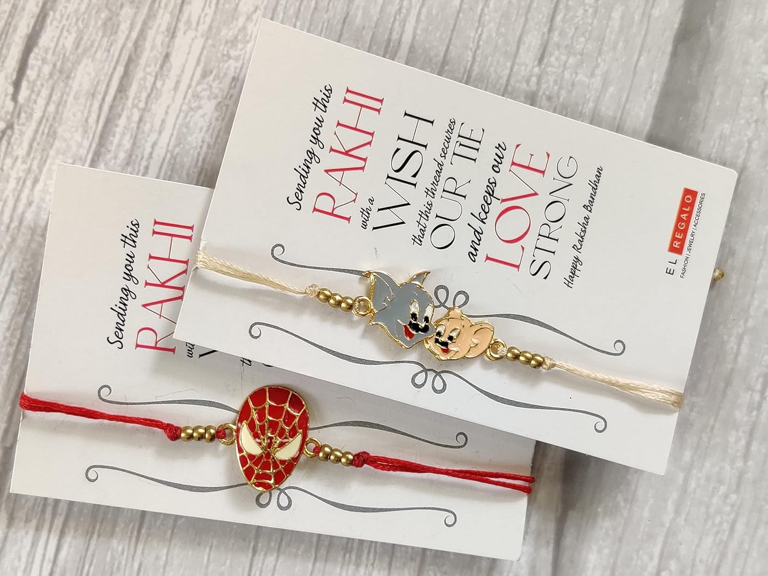 El Regalo 2 PCs Kids Rakhis Combo Set - beautiful 2 Kids Rakhis Set with shagun, Rakhi Message Card in Rakhi Gift Box for Little Brother/Niece/Nephew (Spiderman & Tom Jerry Rakhi)