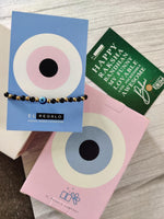 El Regalo Evil Eye Nazaria Rakhi for Babies/Toddler/Kids/Girls & Boys Evil Eye Adjustable Handwoven Nazaria Rakhi for Little Brother/Sister/Niece/Nephew (Evil Eye Nazaria with Tassel)