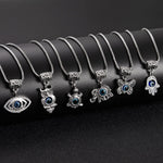 El Regalo Womens 6 Pcs Evil Eye Protection Pendant Necklaces For All - Butterfly, Elephant, Turtle, Elephant, Owl, Hamsa Hand & Eye