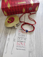 El Regalo Rakhi for Babies - beautiful Evil Eye Nazaria Rakhis for Little Brother/Niece/Nephew Rakhis for Kids/Babies/Toddlers (Red Evil Round)