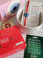 El Regalo 1 Evil Eye Rakhi with and Raksha Bandhan Card - Lucky Evil Eye Protection Rakhi to Avoid Negative Energies for Brother/Sister-in-Law/Niece or Nephew (Heart Evil Eye)