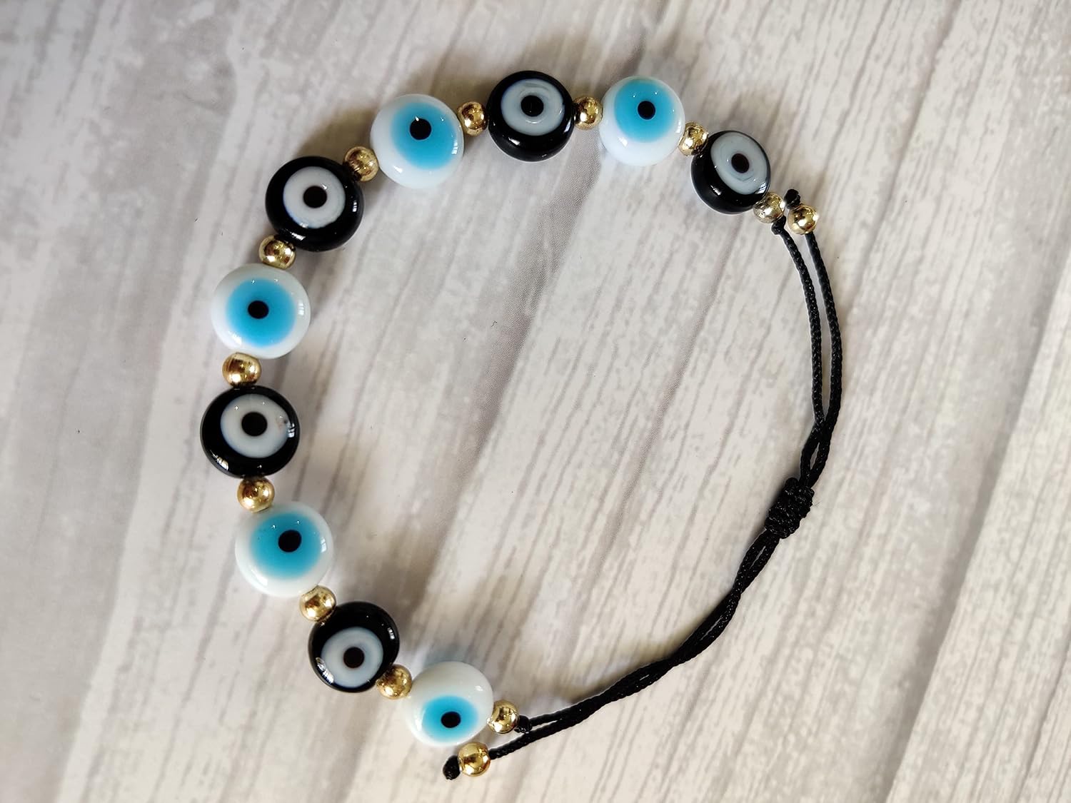 El Regalo Rakhi for Brother - Evil Eye Rakhi for Bhai/Bhabhi with, shagun & Message Card in Rakhi Gift Box (Black White Mix Evil Eye Rakhi)