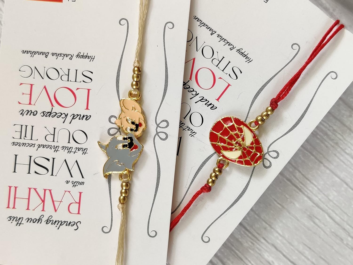 El Regalo 2 PCs Kids Rakhis Combo Set - beautiful 2 Kids Rakhis Set with shagun, Rakhi Message Card in Rakhi Gift Box for Little Brother/Niece/Nephew (Spiderman & Tom Jerry Rakhi)