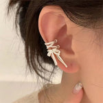 El Regalo Fashionable & Elegant Silver Matt Finish Ear Cuffs for Non Piercing Earrings- Ballet Hollow Cross Ribbon Ear Clips for Girls, Trendy Versatile Clip On Cuff Earrings for Girls & Women