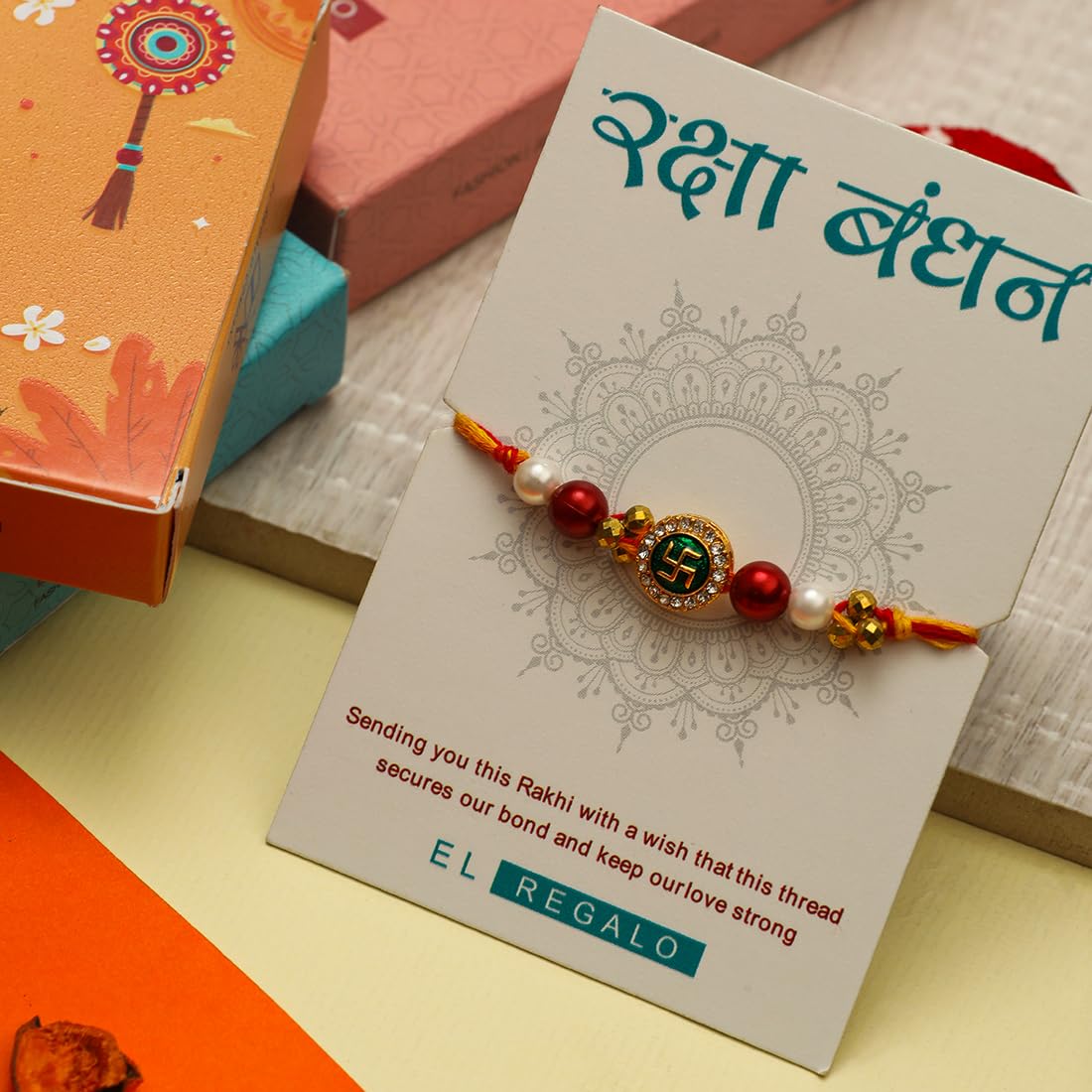 El Regalo 2PCs Fancy OM Ganesha Swastik Red Moli Thread Rakhi Combo for Brother/Bhai/Bhaiya- Auspicious OM/Aum, Ganesha, Satiya Rakhi with Roli Chawal, Rakhi Message Card in Rakhi Gift Box